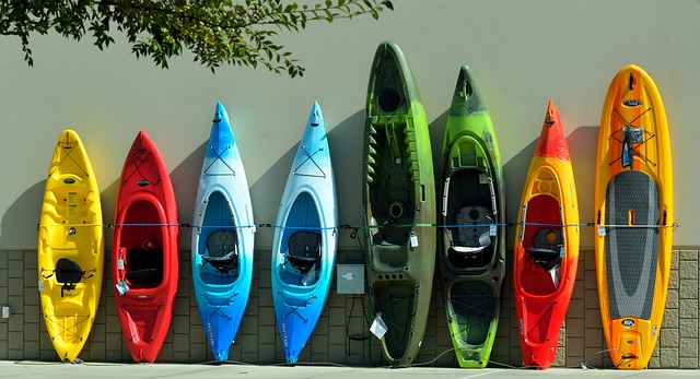 display of kayaks in different colors