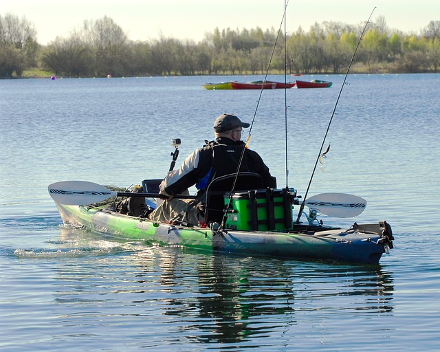 fisherman-angling-in-fishing-kayak