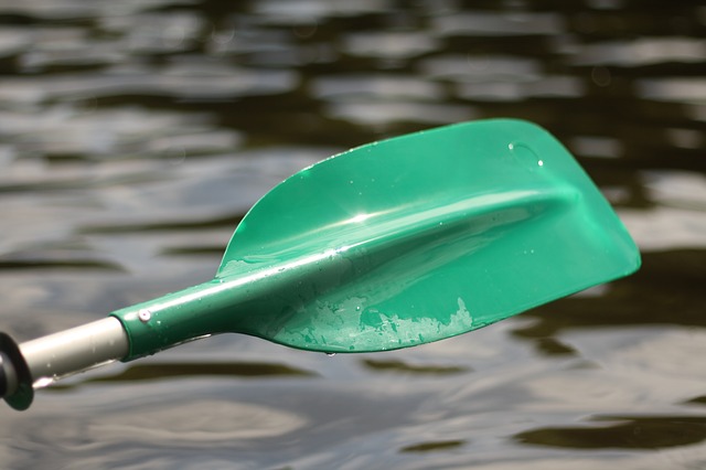 green paddle for a kayak